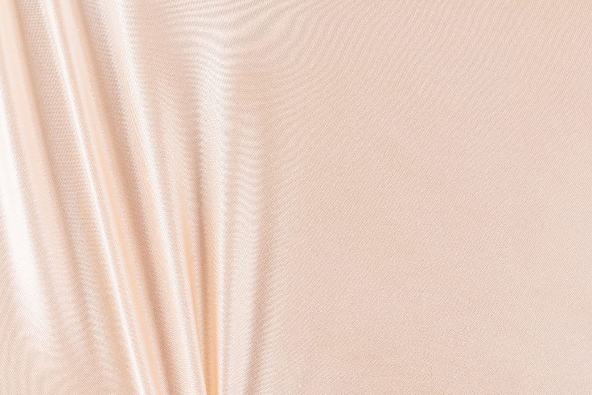 Folds of pale blush silk